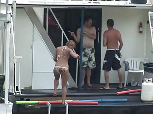 Amateur babes in bikinis dance and get crazy on a yacht