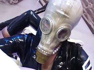 Crazy rubber and gas mask kink threesome starring lesbians