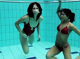 Lesbian fun underwater and naked stripping