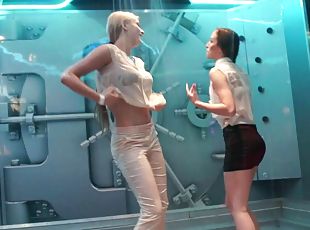 Hot babes dance around while being sprayed with water
