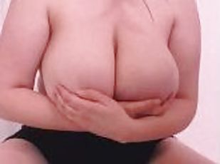 Busty milf shows off huge tits