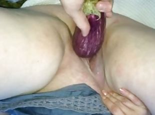 Chubby amateur skank gets her cunt fucked with an eggplant