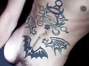 Horny inked twink smokes and flashes hard cock