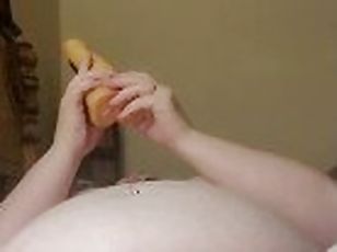 Chubby chick bangs pussy with dildo and cums