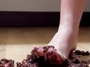 Stepping on cupcake barefoot