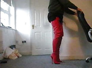Standing in red crotch high ballet Boots