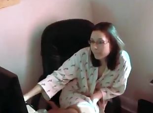 Nerdy girl in glasses watches porn and then gives a blowjob