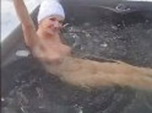 Sexy Milf's boobs bounching nice, when she runs slow motion from Finnish sauna to the jacuzzi