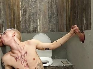 The guy jerked off in the toilet and then he was joined by two penises in holes