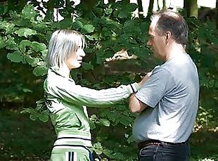 Old Man Fucks a Blonde Beauty Outdoors In The Forest
