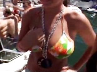 Hot babes enjoy teasing men with their bodies during a beach party