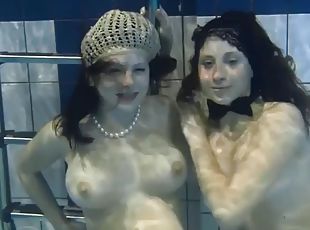 The sexiest girls underwater touch their tits