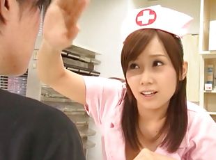 Perverted Japanese nurse gives a skilled blowjob to a waiting patient