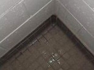 Latino Masturbating in a campus shower after workout