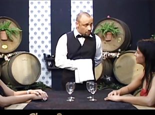 Two horny nymphos seduce and devour the sommelier