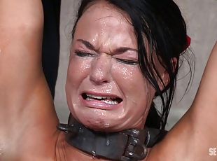 Black-haired cutie almost cries during the painful bondage treatment