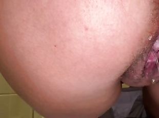 the girl has a hairy pussy with juicy and is peeing again at work